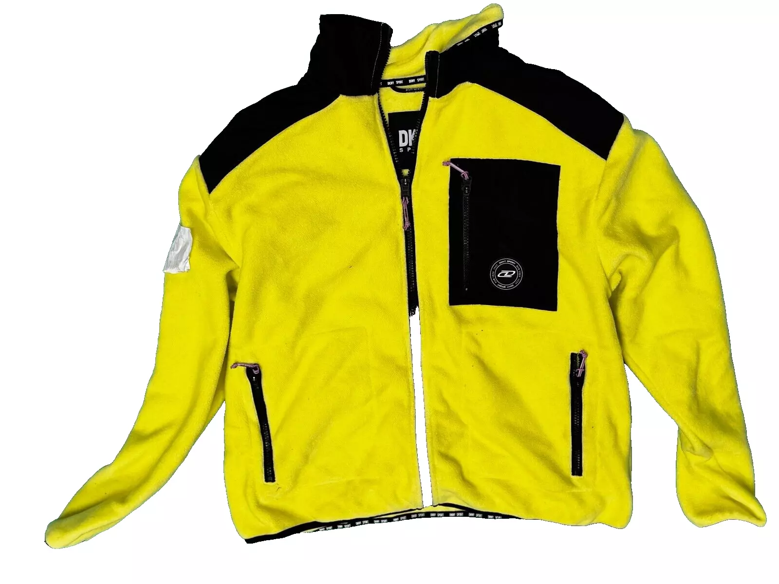 Full view of DKNY Sport neon yellow fleece jacket with black accents and zip pockets