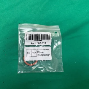 L087-010 universal copper exhaust gasket seal ring in clear packaging, part label visible.